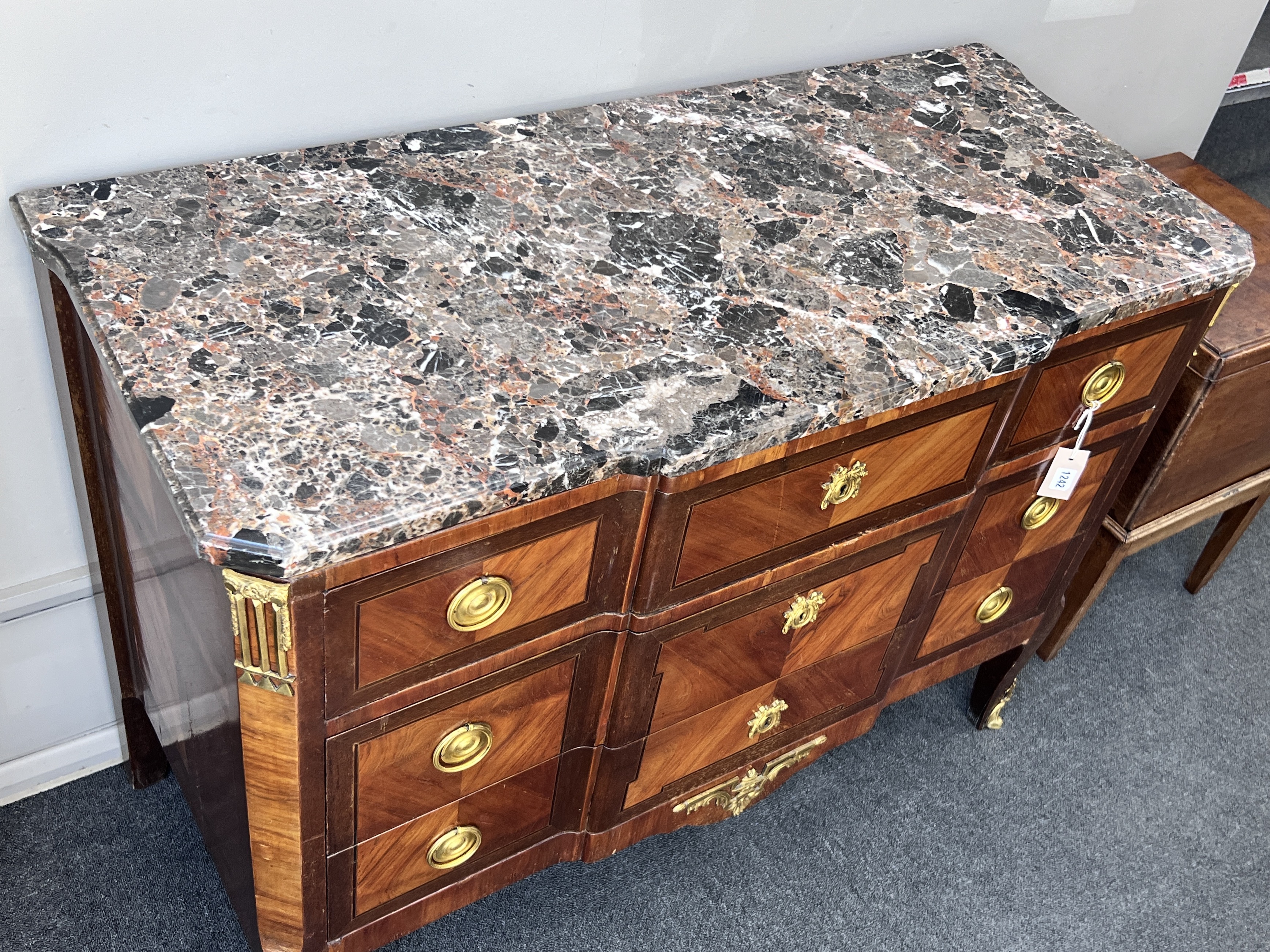 A French transitional style gilt metal mounted marble top kingwood commode, width 118cm, depth 52cm, height 85cm